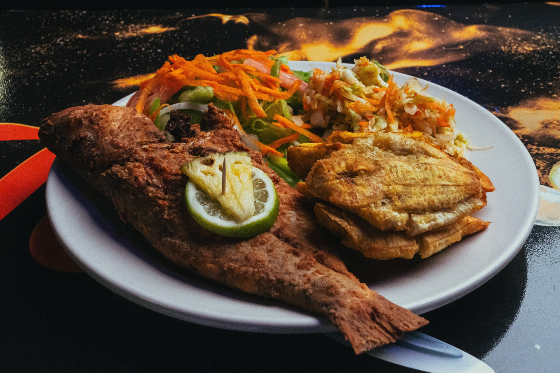 Fried snapper with plantain, straight from the fryer